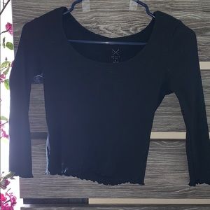 Black ruffle shirt
